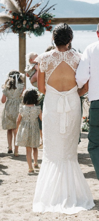 white mini dress with lace sleeves Hearts Aflutter Long Sleeve Open Back Lace Mini Dress White main image 0