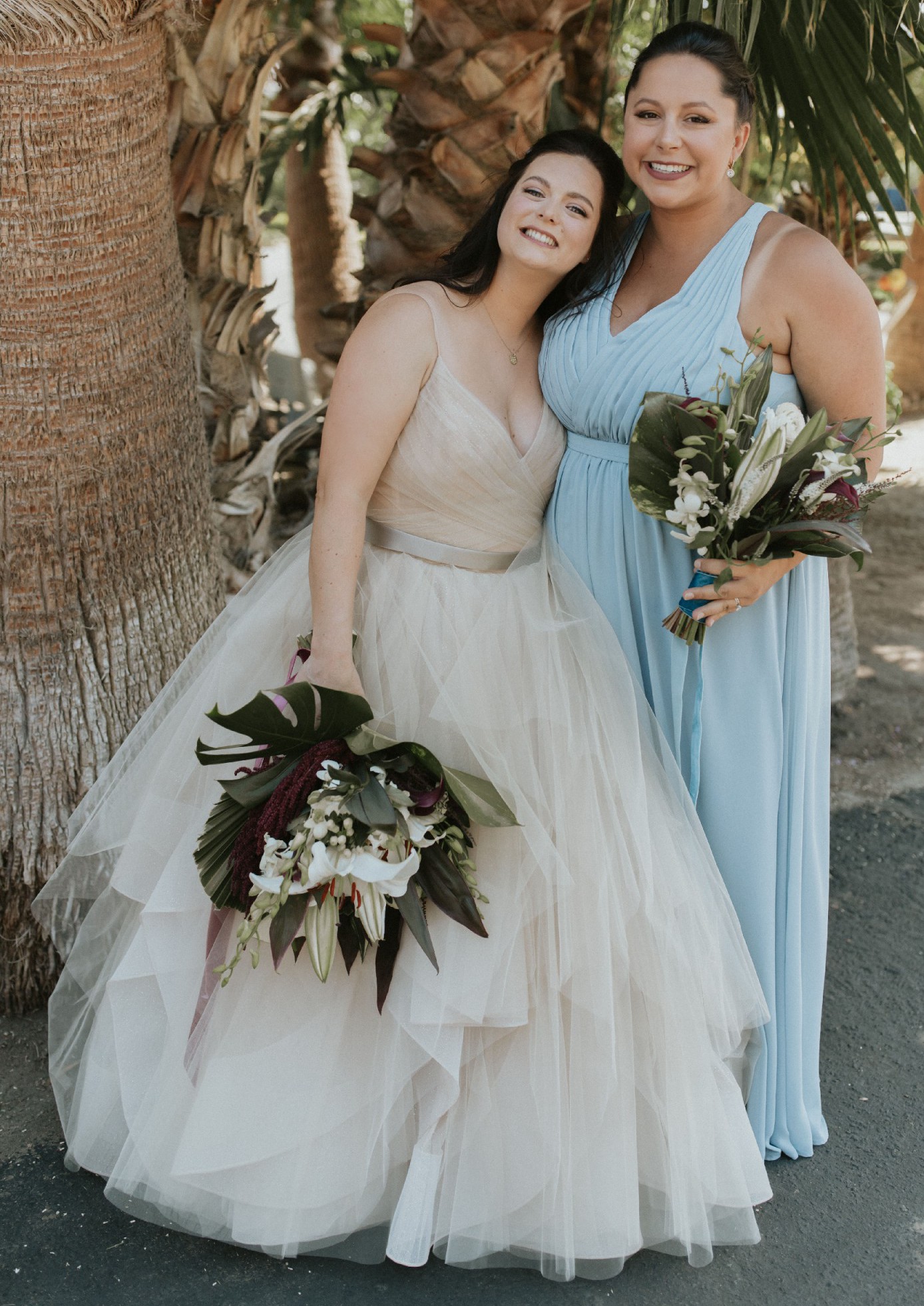 sachin and babi light blue dress This gown has a champagne skirt with a layer of shimmering powdered blue  tule that lays beautifully over the champagne creating just the perfect  twinkle in the light. ✨ style RQ1166 by main image 0